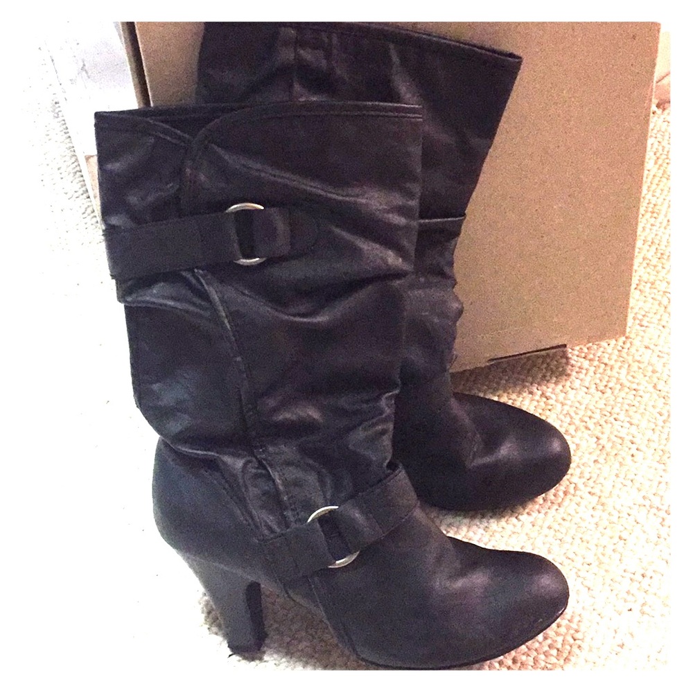 Heeled pull on black boots.